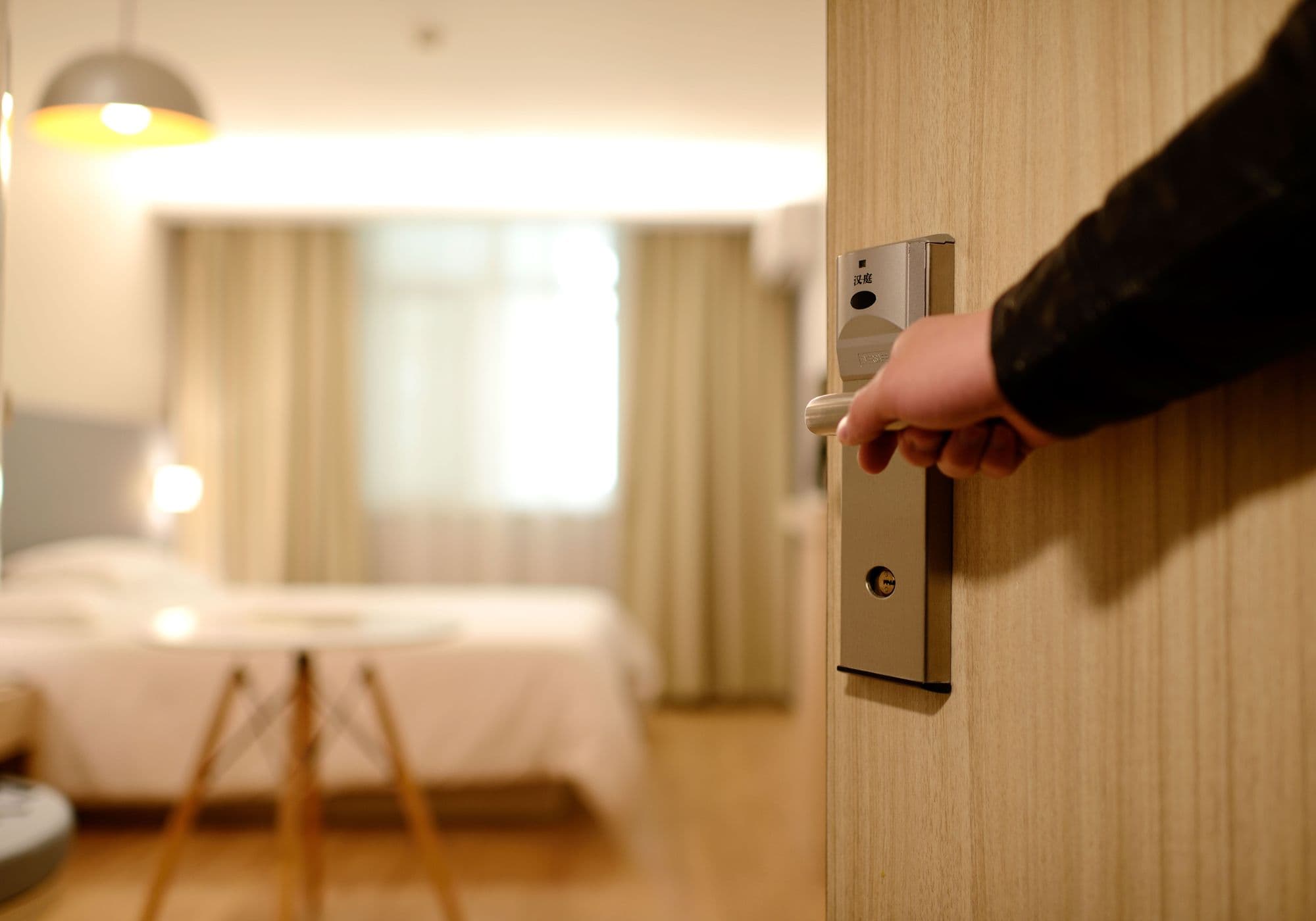 Entering a contemporary hotel room — hospitality illustration